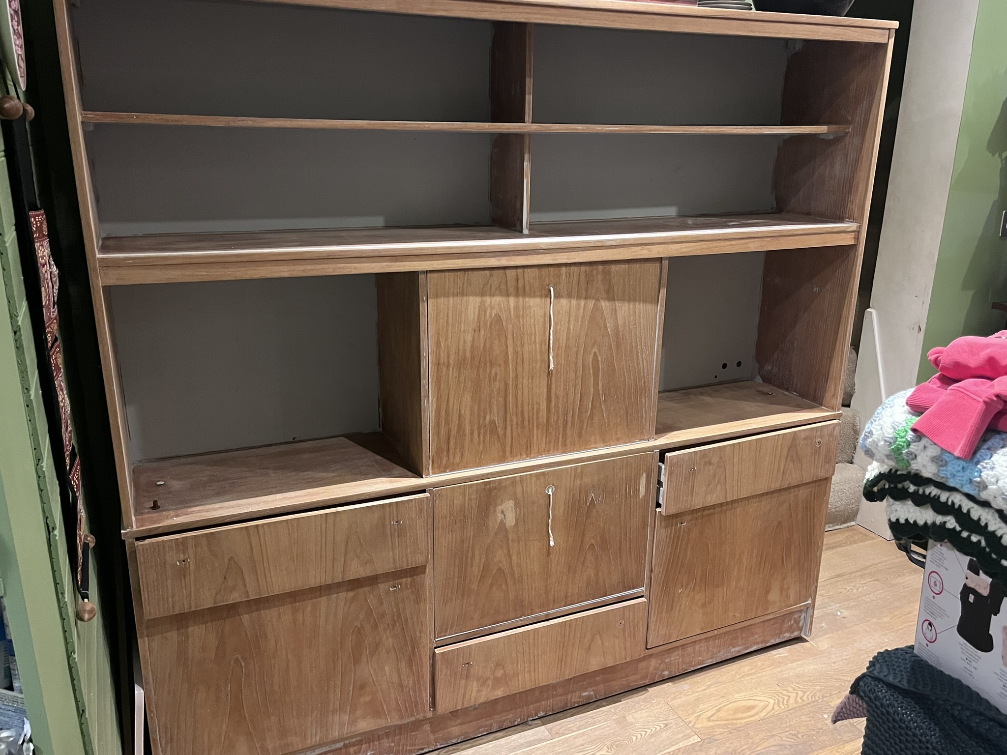 Old brown wall unit before restoration